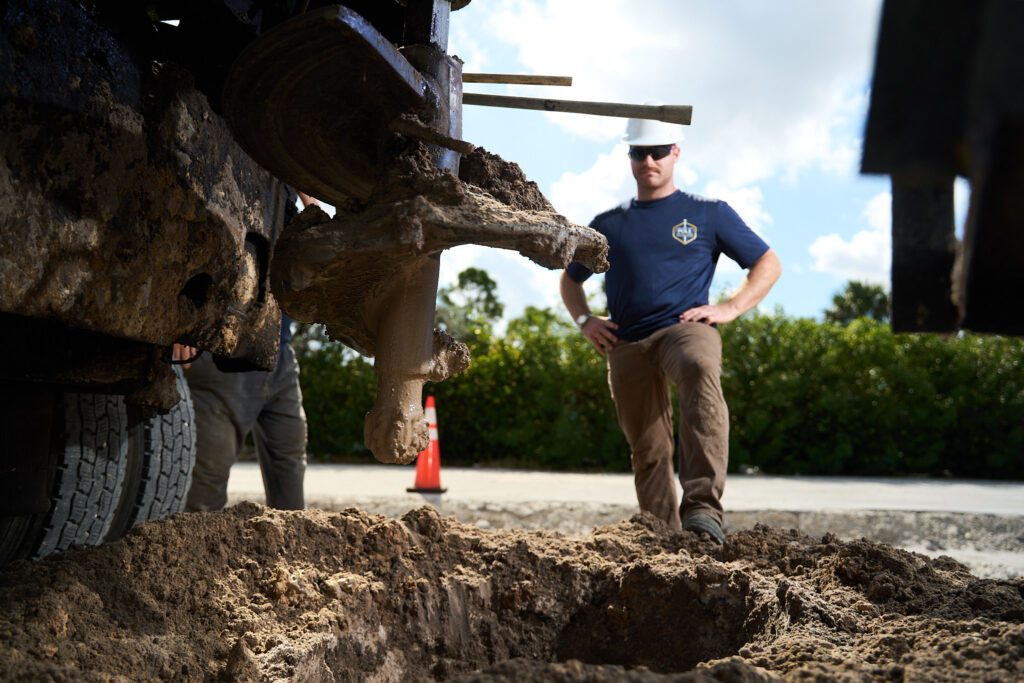 Commercial Pole Setting Contractor working at Florida job site